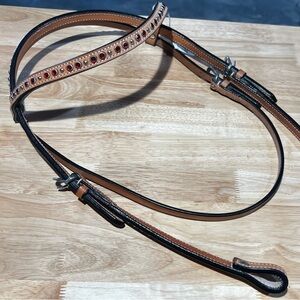 New Riata horse headstall. With red stones and silver grommets